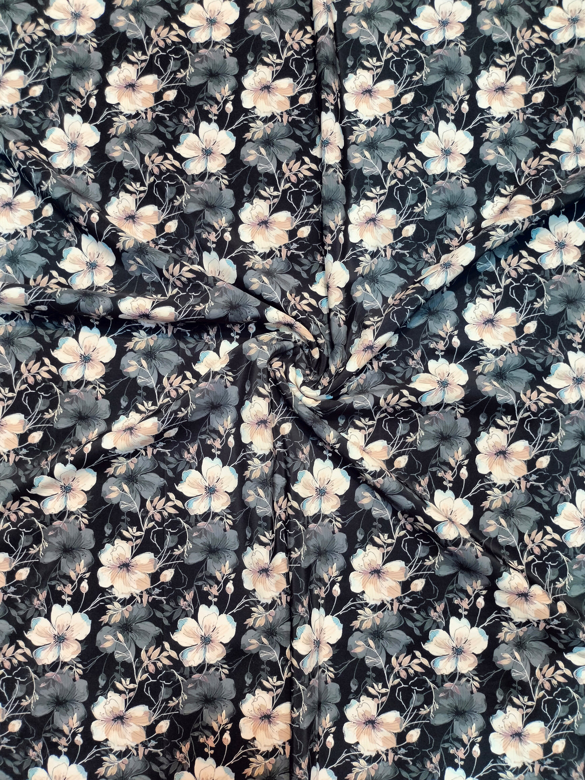 Navy and cream floral BSY dress material folded into a cut piece