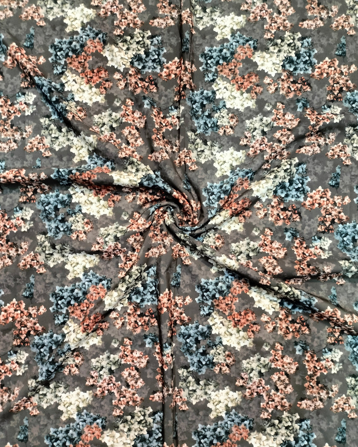 Close detail of the peach and blue blossom print on BSY