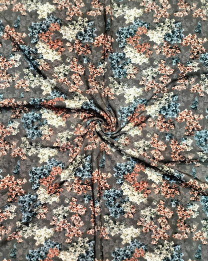 Close detail of the peach and blue blossom print on BSY
