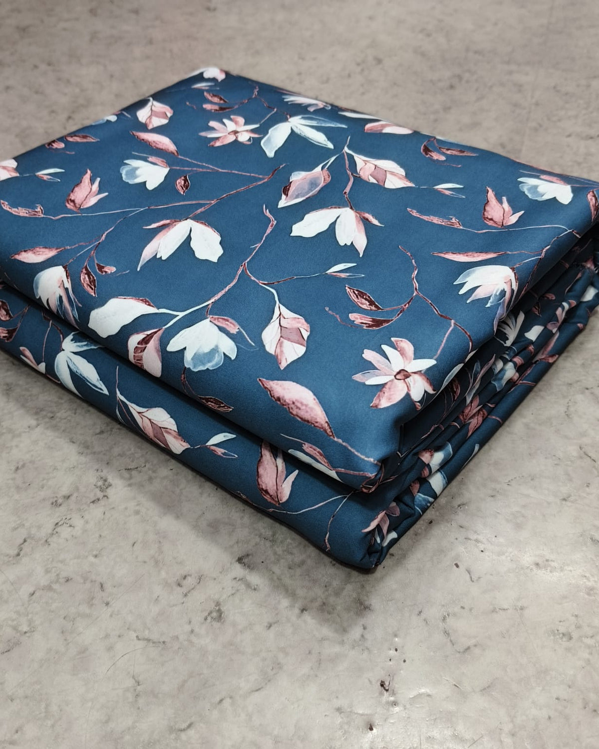 Grey and white floral micro crepe shown full width