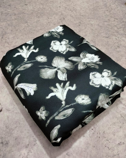 Black and white floral micro crepe weave in close up