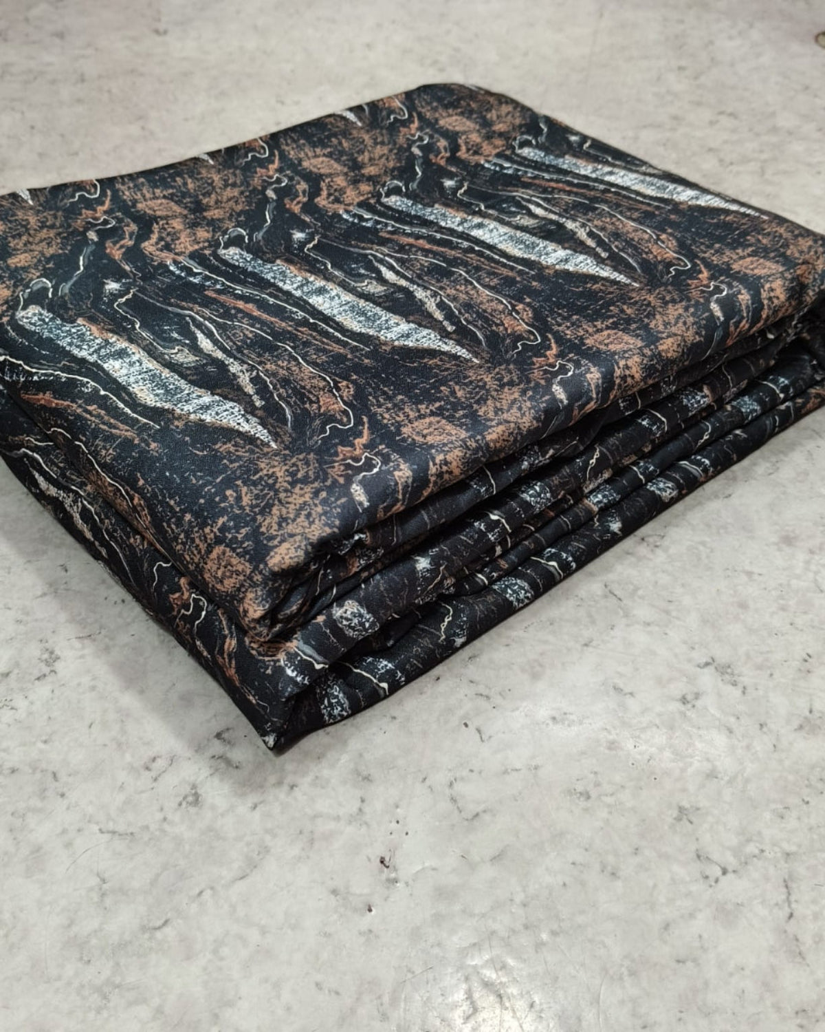 Grey and blue marble moss fabric shown full width