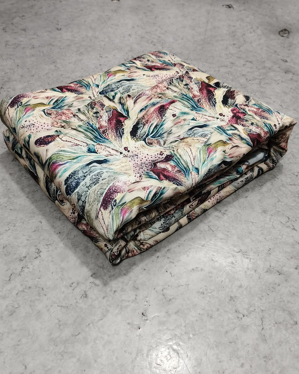 Close detail of the multicolour marble print on moss