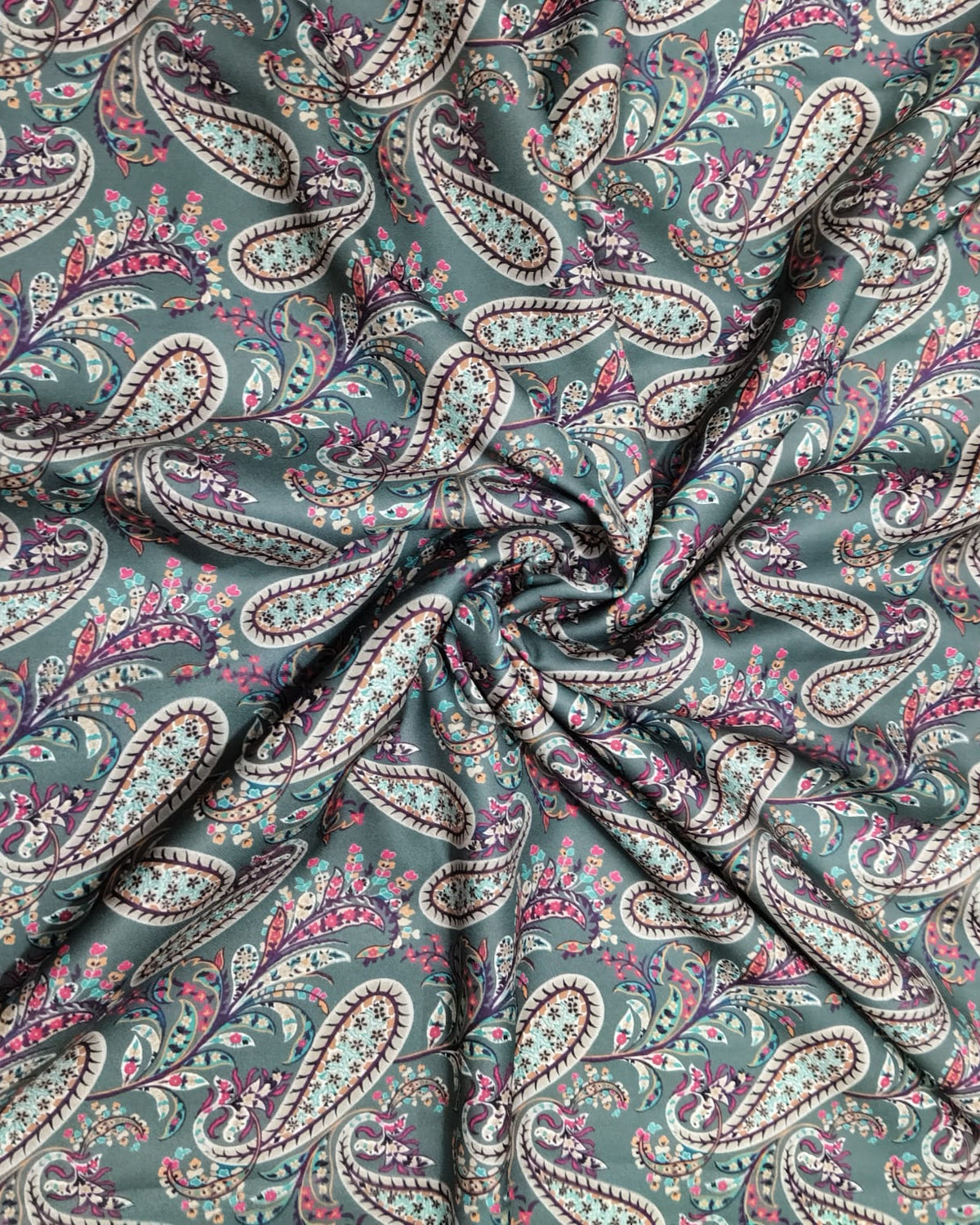 Teal paisley moss fabric shown full width