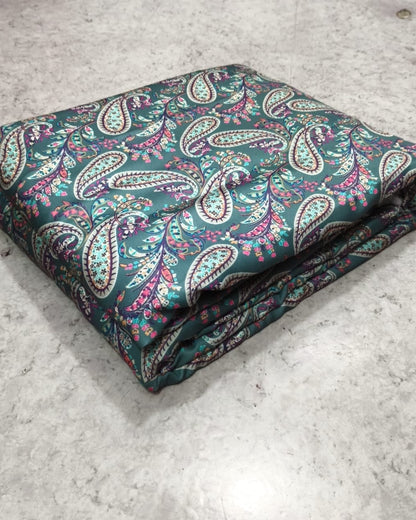 Close detail of the paisley ambi motif on moss