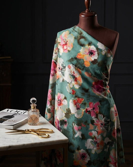 Pink and white blossoms on pastel green BSY dress material, 56 inch width, laid flat
