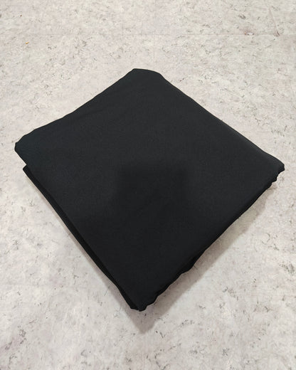 Black micro crepe fabric showing drape and fall